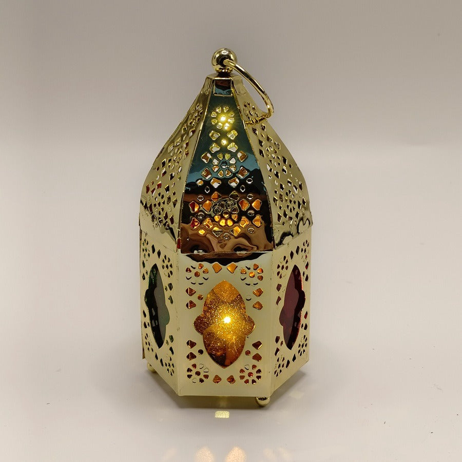 Small gold metal candle lantern with glass