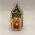 Small gold metal candle lantern with glass