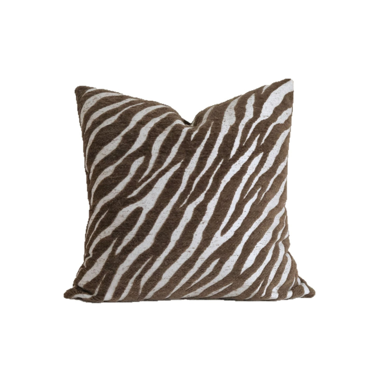 Caramel wabi-sabi textured cushion on a sofa