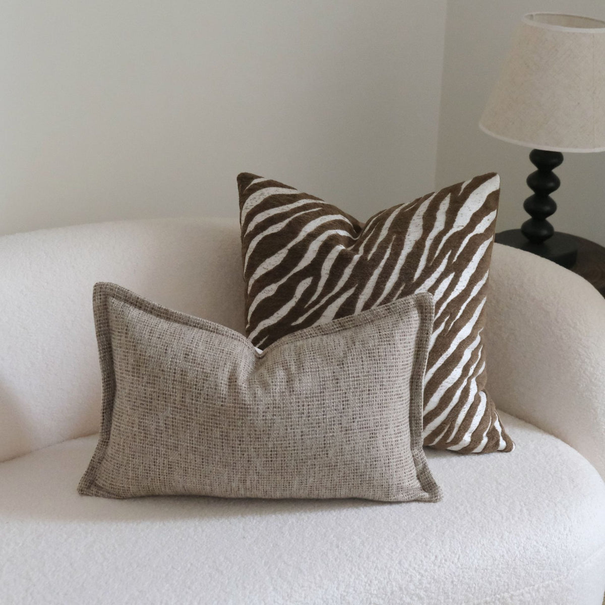 Caramel wabi-sabi textured cushion on a sofa