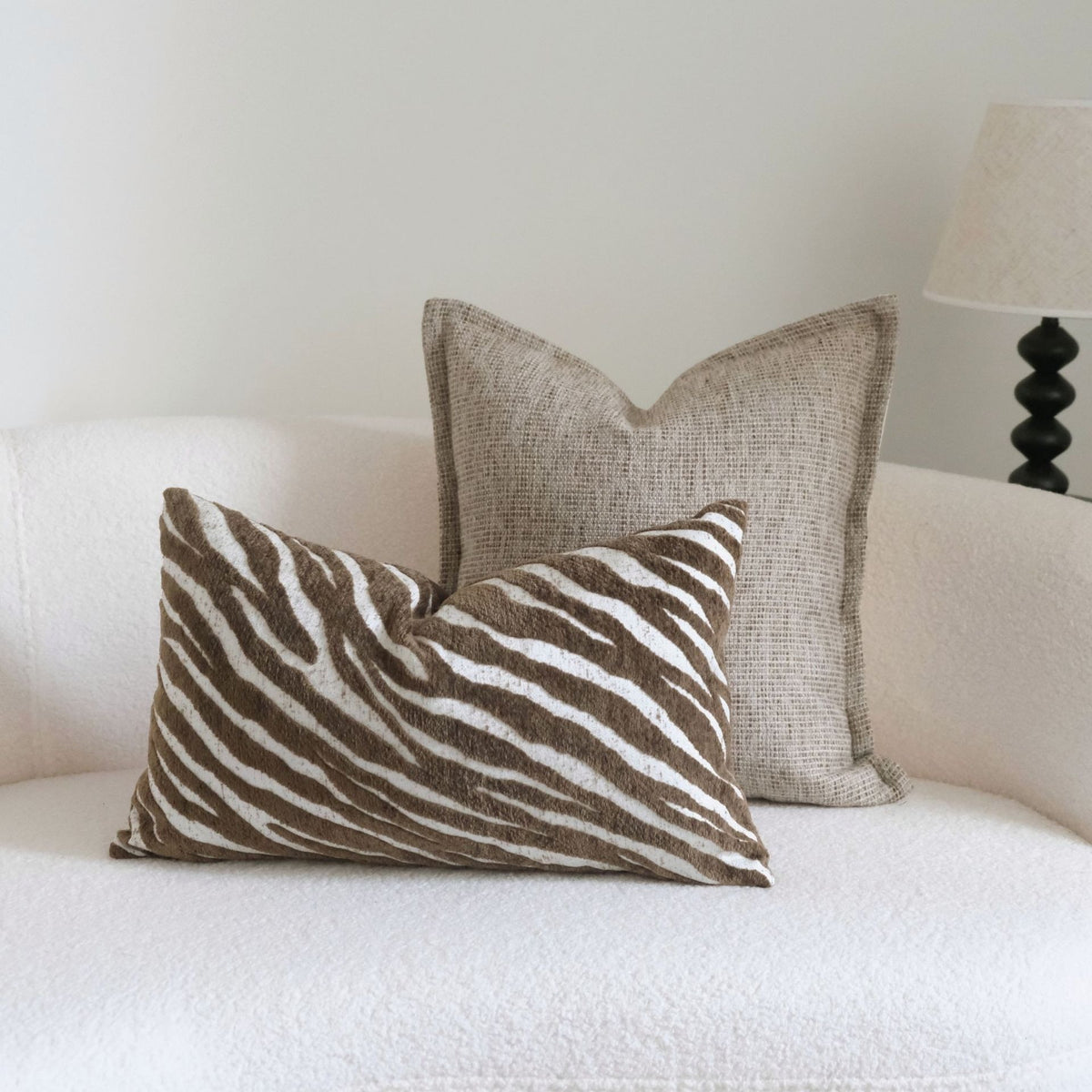 Caramel wabi-sabi textured cushion on a sofa