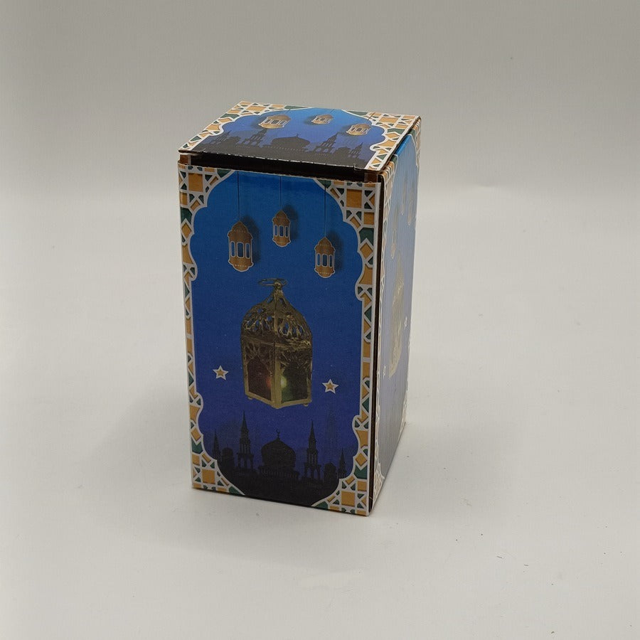 Small gold metal candle lantern with glass