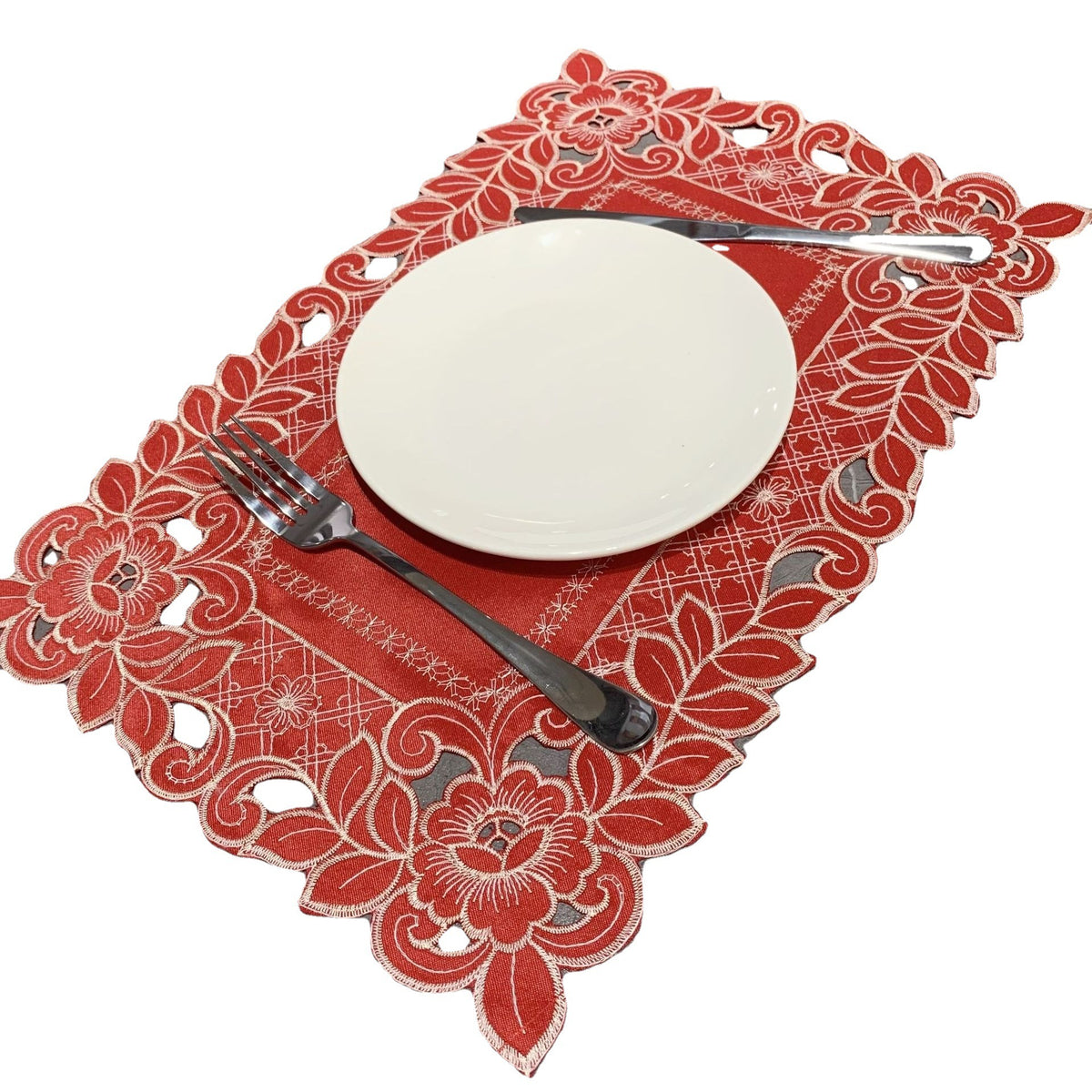 Embroidered cutwork placemat with floral border