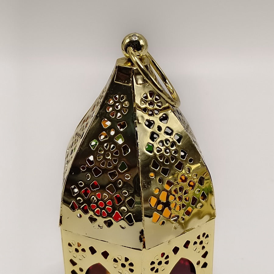 Small gold metal candle lantern with glass