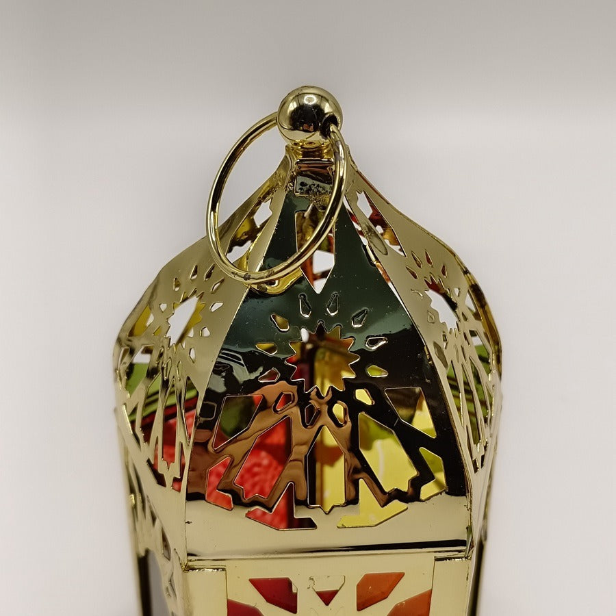 Small gold metal candle lantern with glass